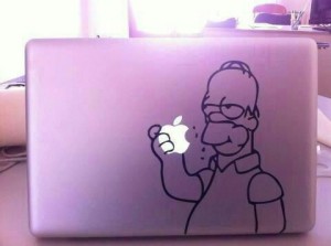 Imagen de Homer simpson comiendo una maczana pegatina mac